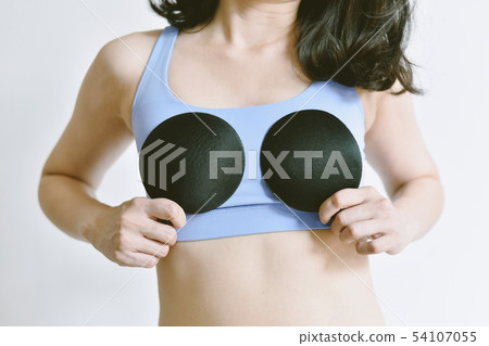 Upsize your breast, Woman in sportwear. 54107055