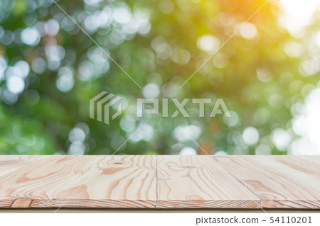 Empty wood table top and blur nature background Empty wood table top and blur nature background 54110201