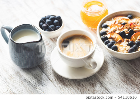 Cup of coffee espresso and breakfast food Cup of coffee espresso and breakfast food 54110610