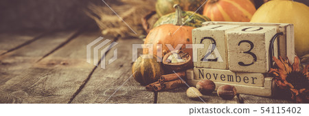 Thanksgiving concept - decorations with pumpkins 54115402