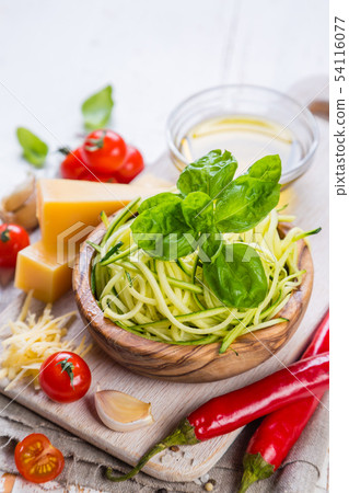 Raw zucchini pasta and ingredients 54116077
