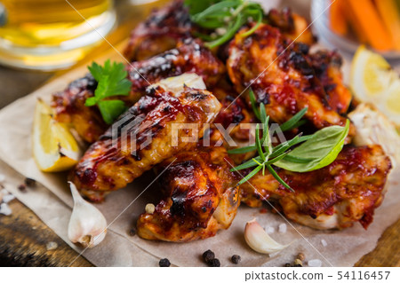 Chicken wings in on wood board 54116457