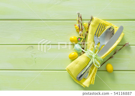 Easter table setting on wood background Easter table setting on wood background 54116887