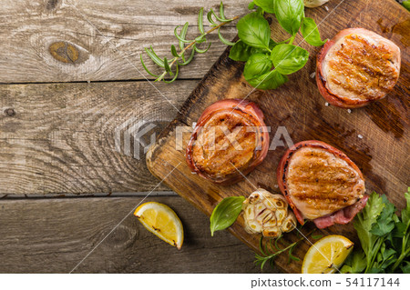Roasted filet mignon with herbs and spices Roasted filet mignon with herbs and spices 54117144