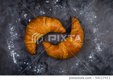 Croissants on rustic background 54117411