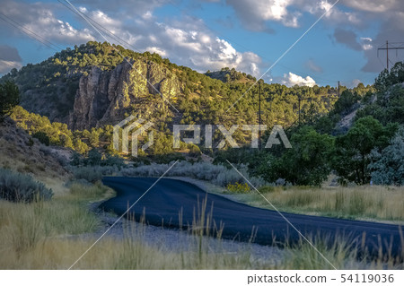 Road with view of Goshen Canyon under cloudy sky 54119036