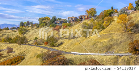 Road on a hill with homes in Salt Lake City Utah 54119037