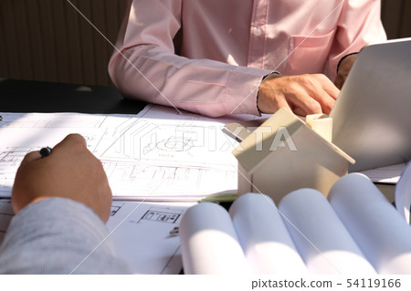 architect engineer team working on house blueprint of real estate project at workplace. construction & building concept 54119166