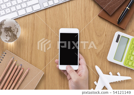 Desktop smartphone high angle 54121149