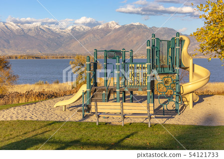 Playground in front of Utah Lake and Mountains 54121733