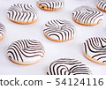 Striped donuts on a white background. 54124116