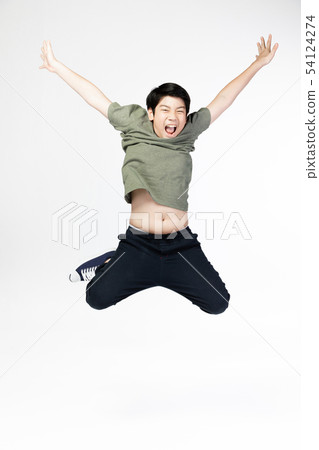 Portrait of happy little Asian child jumping Portrait of happy little Asian child jumping 54124274