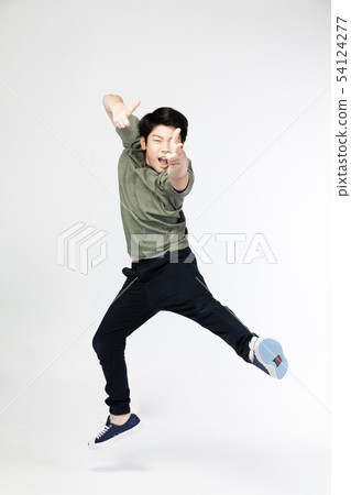 Portrait of happy little Asian child jumping Portrait of happy little Asian child jumping 54124277