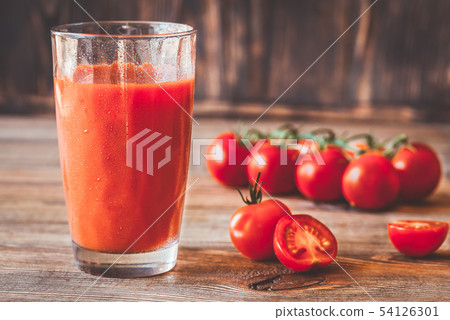 A glass of tomato juice A glass of tomato juice 54126301