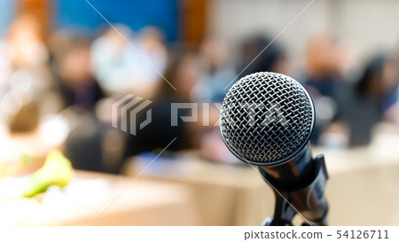 Microphone in the conference room blurred backgrou 54126711