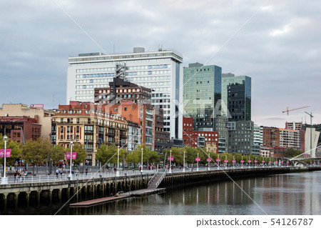 The cityscape of Bilbao, Spain. The Nervion river crosses Bilbao downtown The cityscape of Bilbao, Spain. The Nervion river crosses Bilbao downtown 54126787