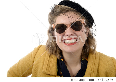 Portrait of a beautiful woman with vintage clothes Portrait of a beautiful woman with vintage clothes 54129386