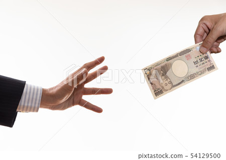 The hand of a person trying to grab cash The hand of a person trying to grab cash 54129500