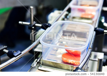 beef steak in boxes transfer on conveyor systems beef steak in boxes transfer on conveyor systems 54130840