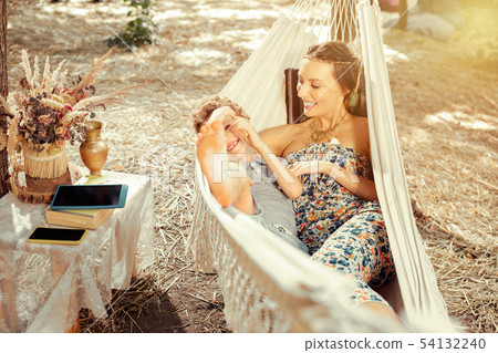 Happy joyful mother and son resting together 54132240