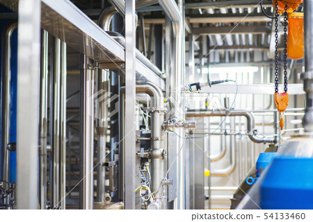 Stainless steel pipes in the factory. Construction Stainless steel pipes in the factory. Construction 54133460