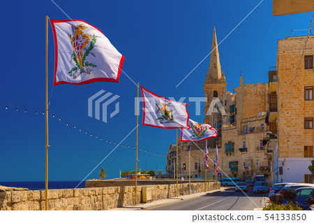 Decorated street in old town of Valletta, Malta 54133850