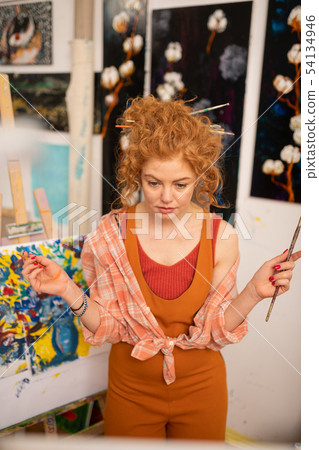 Artist having some hesitations while choosing color Artist having some hesitations while choosing color 54134946