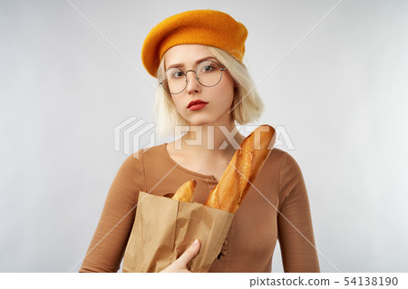 girl in a yellow beret looks at camera girl in a yellow beret looks at camera 54138190