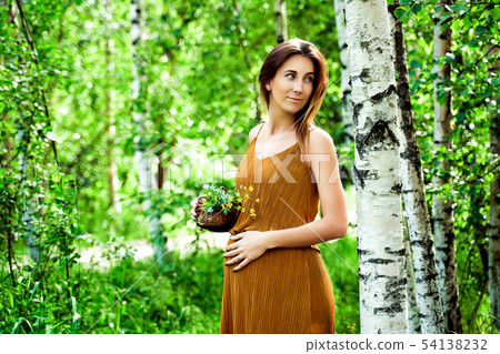 A beautiful young pregnant woman A beautiful young pregnant woman 54138232
