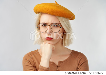 Portrait girl concentrated thoughtful expression 54138677