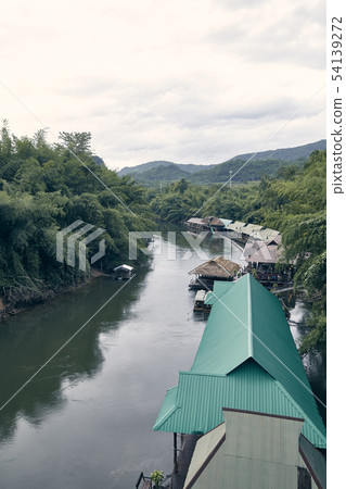 Many wooden house floating on the river 54139272
