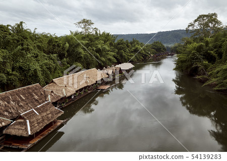 Many wooden house floating on the river 54139283