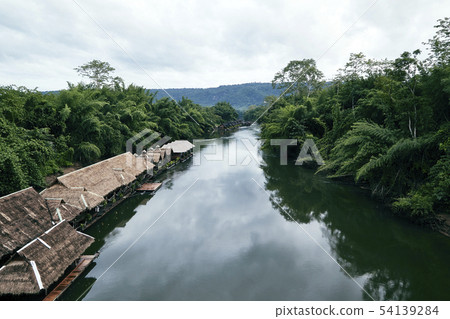 Many wooden house floating on the river 54139284