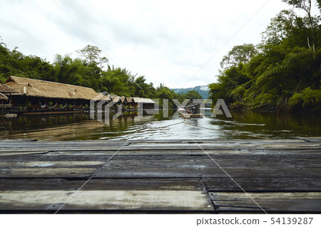 Many wooden house floating on the river 54139287