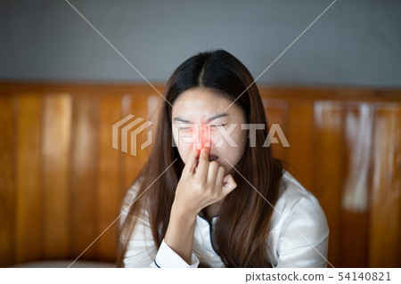 Asian young Woman have a Nasal pain 54140821