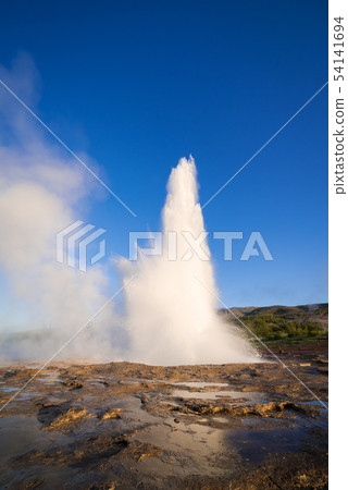 Eruption of the geyser in Iceland Eruption of the geyser in Iceland 54141694