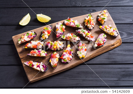 Traditional  Peruvian food background with mussels 54142609