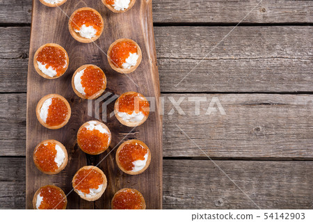 Tartalets with red caviar 54142903