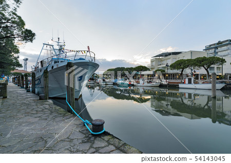 The harbor in Caorle with fish boats. 54143045