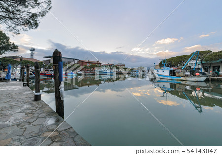The harbor in Caorle with colored traditional and The harbor in Caorle with colored traditional and 54143047