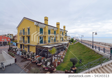 Colorfull embankment in Caorle Italy in day time 54143313