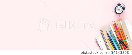 School stationary on pink background. 54143808