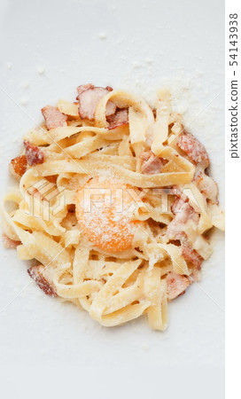 Traditional italian pasta carbonara with bacon and egg Traditional italian pasta carbonara with bacon and egg 54143938