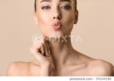 Lovely Girl Sending Kiss With Pout Lips 54144190