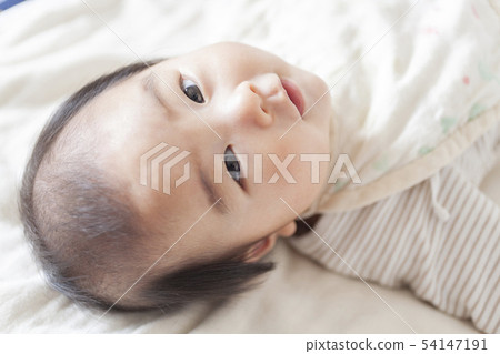 A naked baby A naked baby 54147191