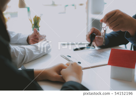 lawyer insurance broker consulting giving legal advice to couple customer about buying renting house. financial advisor with mortgage loan investment contract. realtor selling real estate 54152196