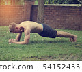 Confident muscled young man wearing sport wear and 54152433