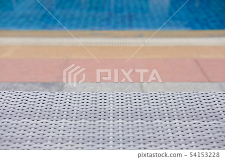 wicker rattan pool sun bed deckchair at swimming pool wicker rattan pool sun bed deckchair at swimming pool 54153228