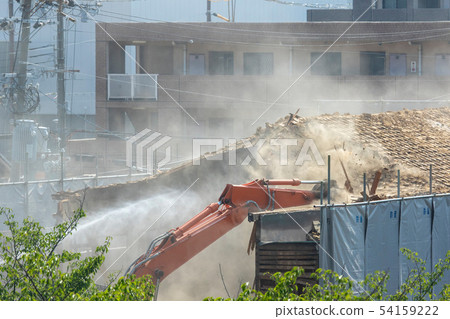 Demolition site of a dusty building 54159222