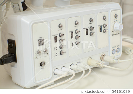 Cosmetic Multifunctional Device close-up in beauty Cosmetic Multifunctional Device close-up in beauty 54161029